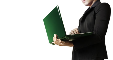 businessman's hands on notebook keyboard in the office の写真素材