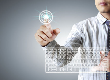 hand pushing on a touch screen interface の写真素材