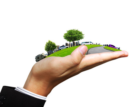 human hand holding a city の写真素材
