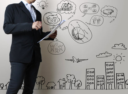 businessman with marker writing something の写真素材