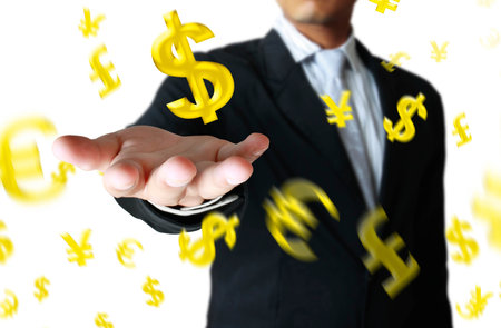 Businessman with a money icon floating in the airの写真素材