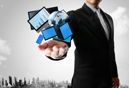 Ideas, Technology in the hands with businessmanの写真素材