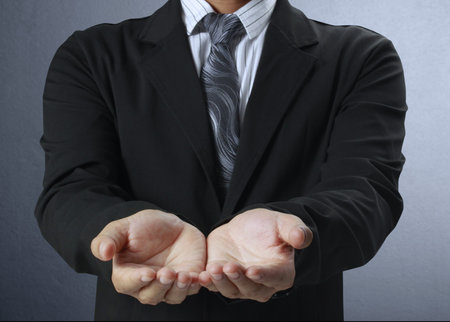 Businessman ,open a hand の写真素材