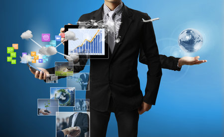 Technology in the hands of businessmen の写真素材