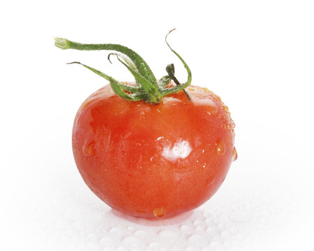 Red tomatoes Isolated on white background の写真素材