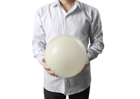 holding a glowing earth globe in his hands の写真素材