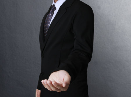 Open palm hand gesture of male hand の写真素材
