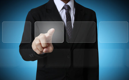 pushing on a touch screen interface の写真素材