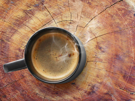 cup of coffee on a wood の写真素材