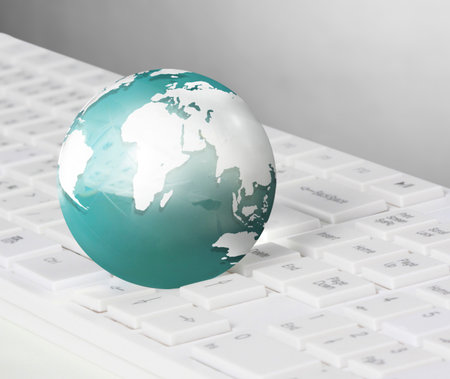 Globe and Computer Keyboardの写真素材
