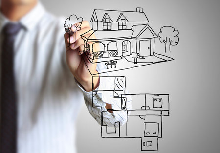 hand drawing house in a whiteboard の写真素材