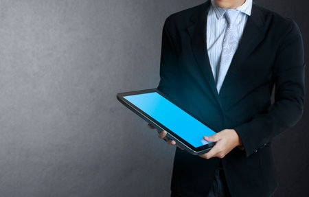 tablet computer isolated in a hand on,show graphの写真素材