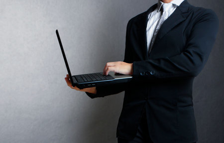 tablet computer isolated in a hand on,show graphの写真素材