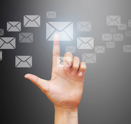 Finger pressing the touch screen displayの写真素材