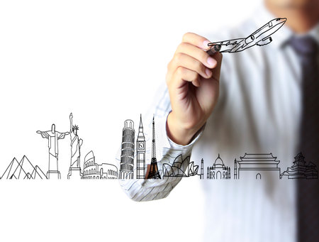 Business man drawing a houseの写真素材