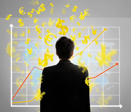 Businessman with financial symbols comingの写真素材