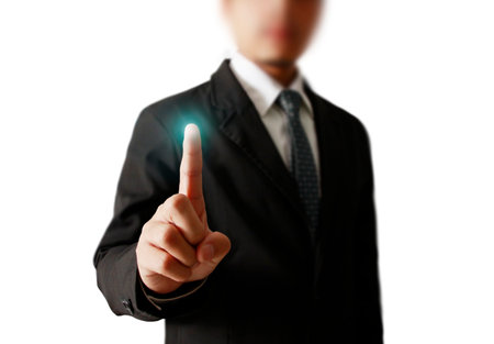 Man hand pushing on a touch screen interfaceの写真素材