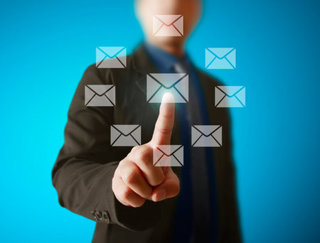 Businessman pressing virtual icons, technology conceptの写真素材