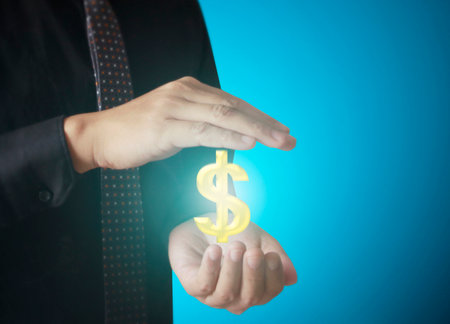 Man touching online button with money icon, money conceptの写真素材