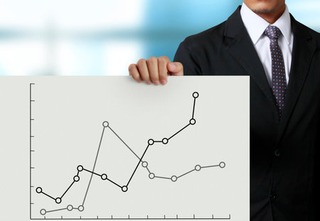 holding white a blank billboardの写真素材