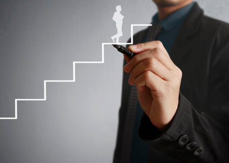 Businessman drawing graphics a growing graphの写真素材