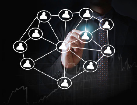 Business man drawing social network structureの写真素材