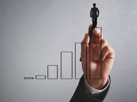 Businessman drawing graphics a growing graphの写真素材