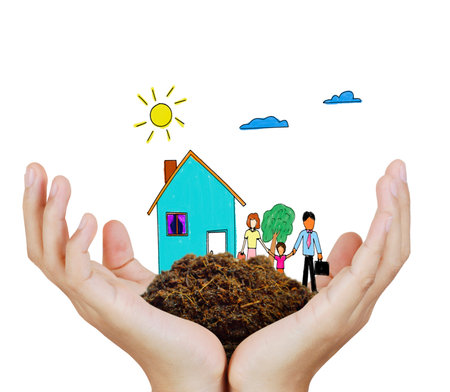 Business man house in human handsの写真素材