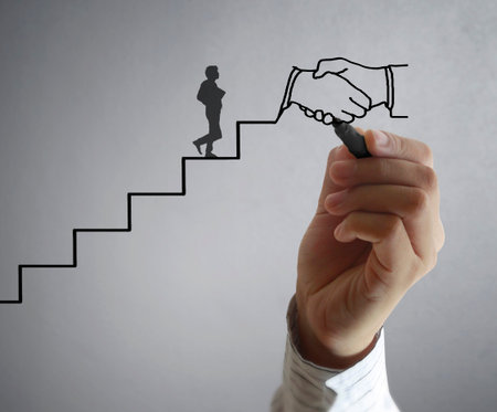 Businessman drawing graphics a growing graphの写真素材