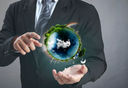 Globe ,earth in human hand, hand holding our planet earth glowing. Earth image provided by Nasaの写真素材