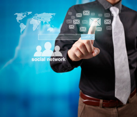 touching virtual icon of social networkの写真素材
