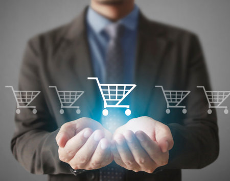 businessman with financial symbols coming from handの写真素材