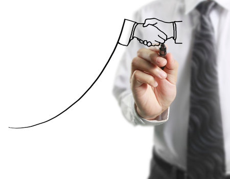 Businessman drawing graphics a growing graphの写真素材