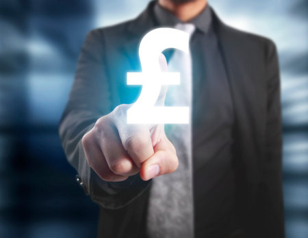 businessman with financial symbols coming from handの写真素材