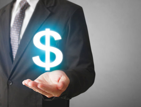 Money icon in hand, money conceptの写真素材