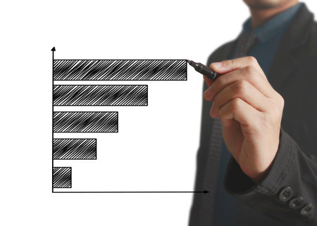 Businessman drawing graphics a growing graphの写真素材