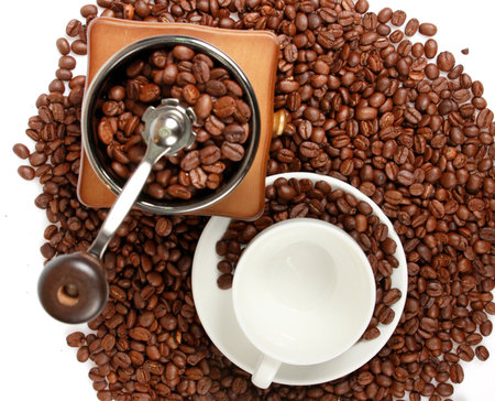 Vintage coffee mill with coffee beans cupの写真素材