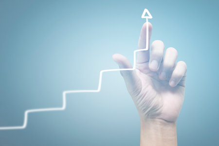 Hand touching a graphs of financial indicator and accounting market economy analysis chartの写真素材