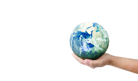 Globe earth in human hand, holding our planet glowing.の写真素材