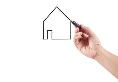 Hand is ready for drawing house ,Hand with a penの写真素材