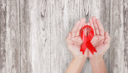 Healthcare and medicine ,hands holding ribbon