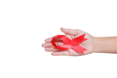 Healthcare and medicine. hands holding ribbonの写真素材