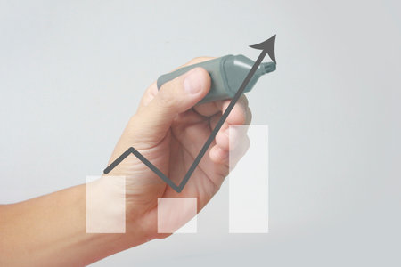 Hand drawing a chart, graph stock of growthの写真素材
