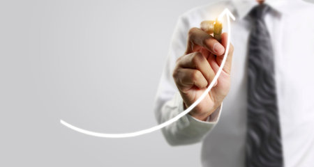 Hand drawing a chart, graph stock of growthの写真素材