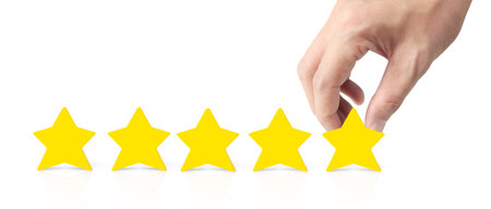 Hand of putting increase five a star shape on white