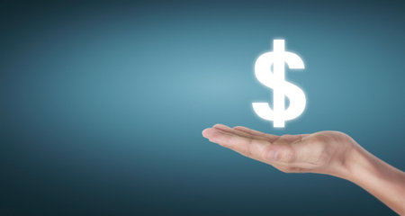 Hand touching a graphs of financial indicator and accounting market economy analysis chartの写真素材