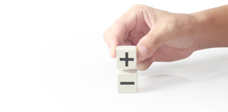 Cube block in hand with symbolの写真素材