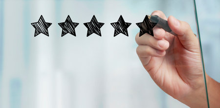 Hand drawing a five star rating.