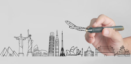 Hand is ready for drawing travelの写真素材