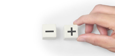 Concept creative idea and innovation. cube block in hand with symbolの写真素材